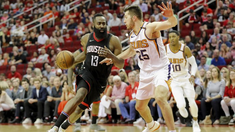 James Harden drives to the basket around Phoenix’s Alec Peters
