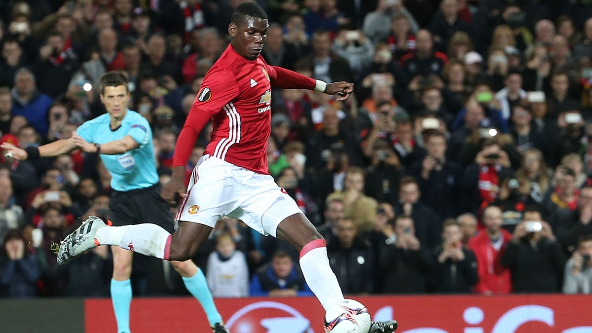 Paul Pogba of Manchester United kicking a soccer ball