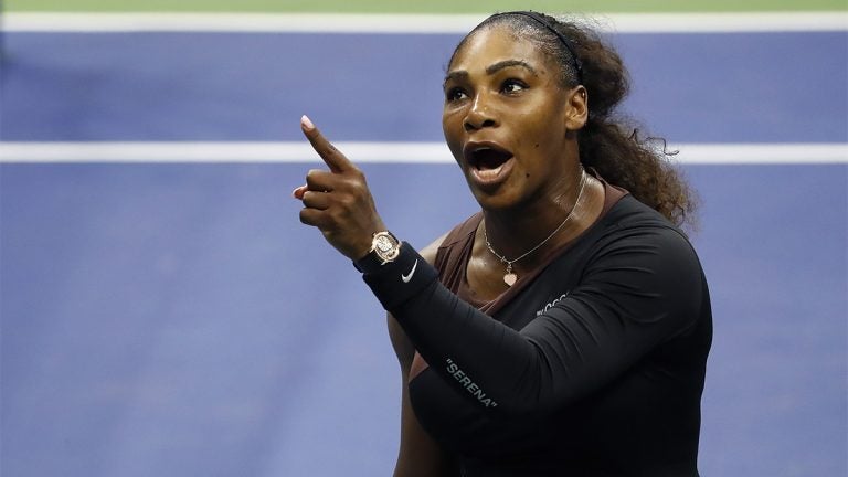 Serena Williams returns a shot in the Ladies’ Singles Final on Center Court at Wimbledon 2018