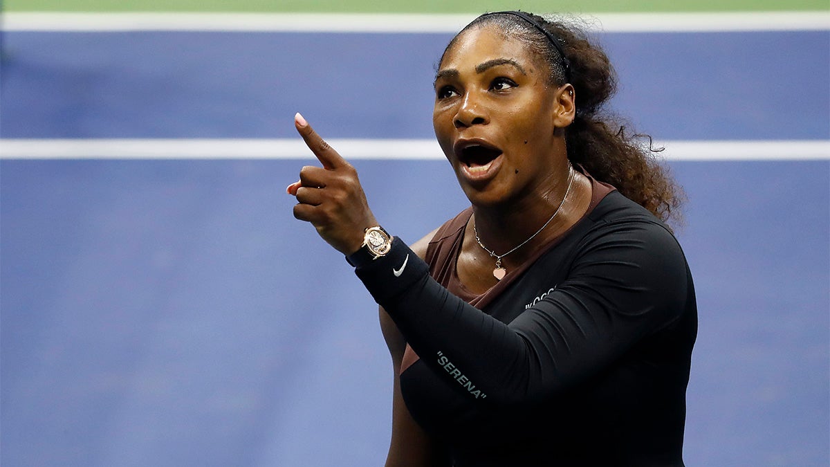 Serena Williams returns a shot in the Ladies’ Singles Final on Center Court at Wimbledon 2018