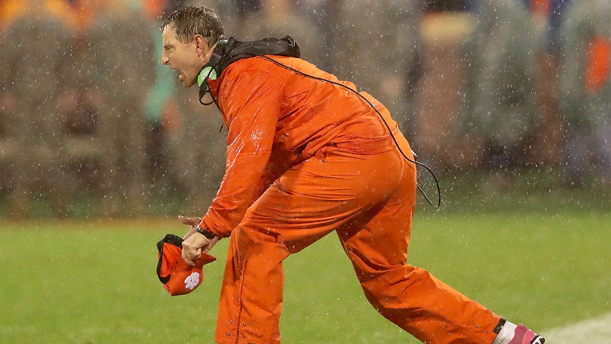 Head coach Dabo Swinney of the Clemson Tigers yells to his team during a game in 2017