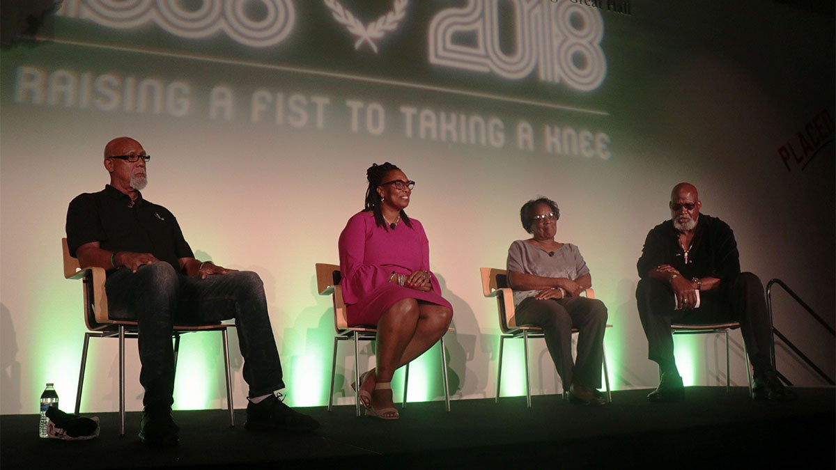 John Carlos, Gina Hemphill-Strachan, Wyomia Tyus and Dr. Harry Edwards on stage at the “Raising a Fist to Taking a Knee” event in Phoenix