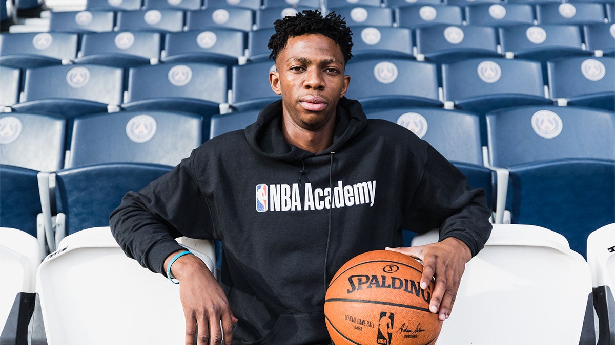 NBA Academy Graduate Patrick Mwamba poses for a photo