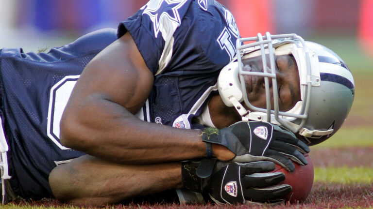 Dallas wide receiver Terrell Owens (81) pretends to sleep in the endzone after scoring a touchdown in the third quarter of the Cowboys 22-19 loss to the Washington Football Team, Sunday, November 5, 2006 at FedEx Field in Landover, Maryland. Dallas was penalized for excessive celebration. (Photo by Ron Jenkins/Fort Worth Star-Telegram/Tribune News Service via Getty Images)