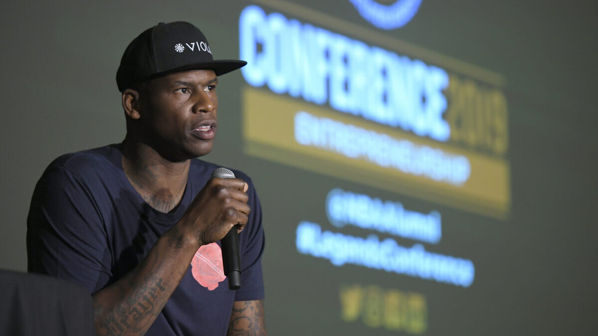 Al Harrington speaking at a conference