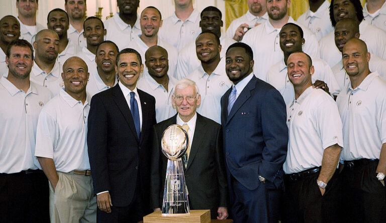 WASHINGTON - MAY 21: U.S. President Barack Obama (3rd L) poses with Pittsburgh Steelers Chairman Dan Rooney (C) and Head Coach Mike Tomlin (3rd R) during a picture with the 2009 NFL Super Bowl champion Pittsburgh Steelers in the East Room of the White House May 21, 2009 in Washington, DC. (Photo by Aude Guerrucci-Pool/Getty Images)