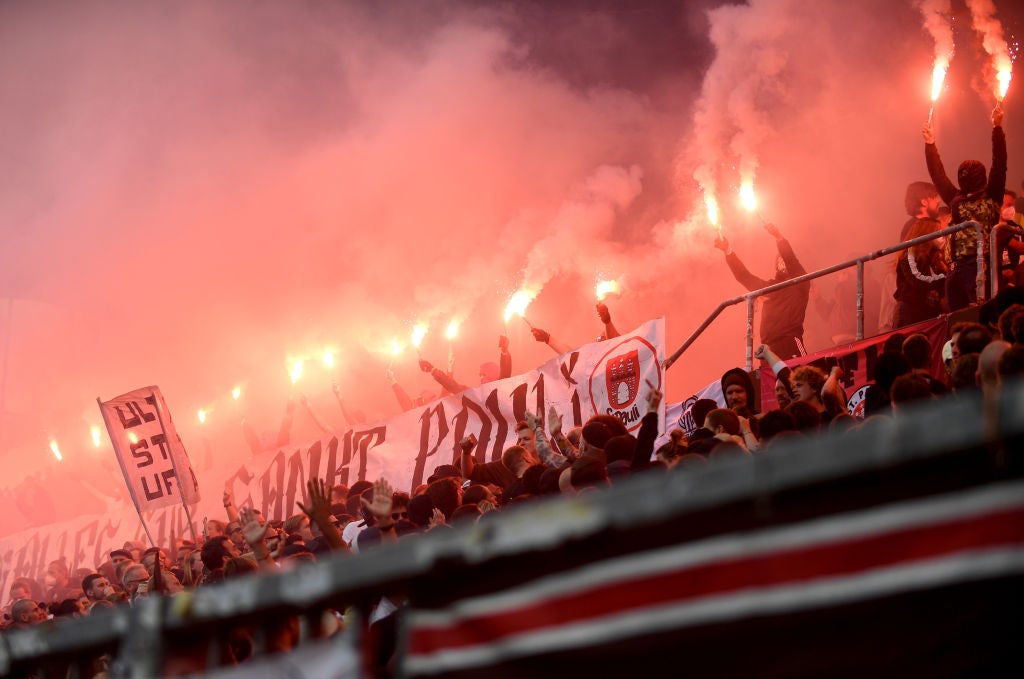 Fans of Palermo Football Club show their colors on game day